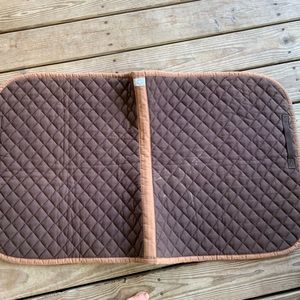 Brown and tan Hermès saddle pad